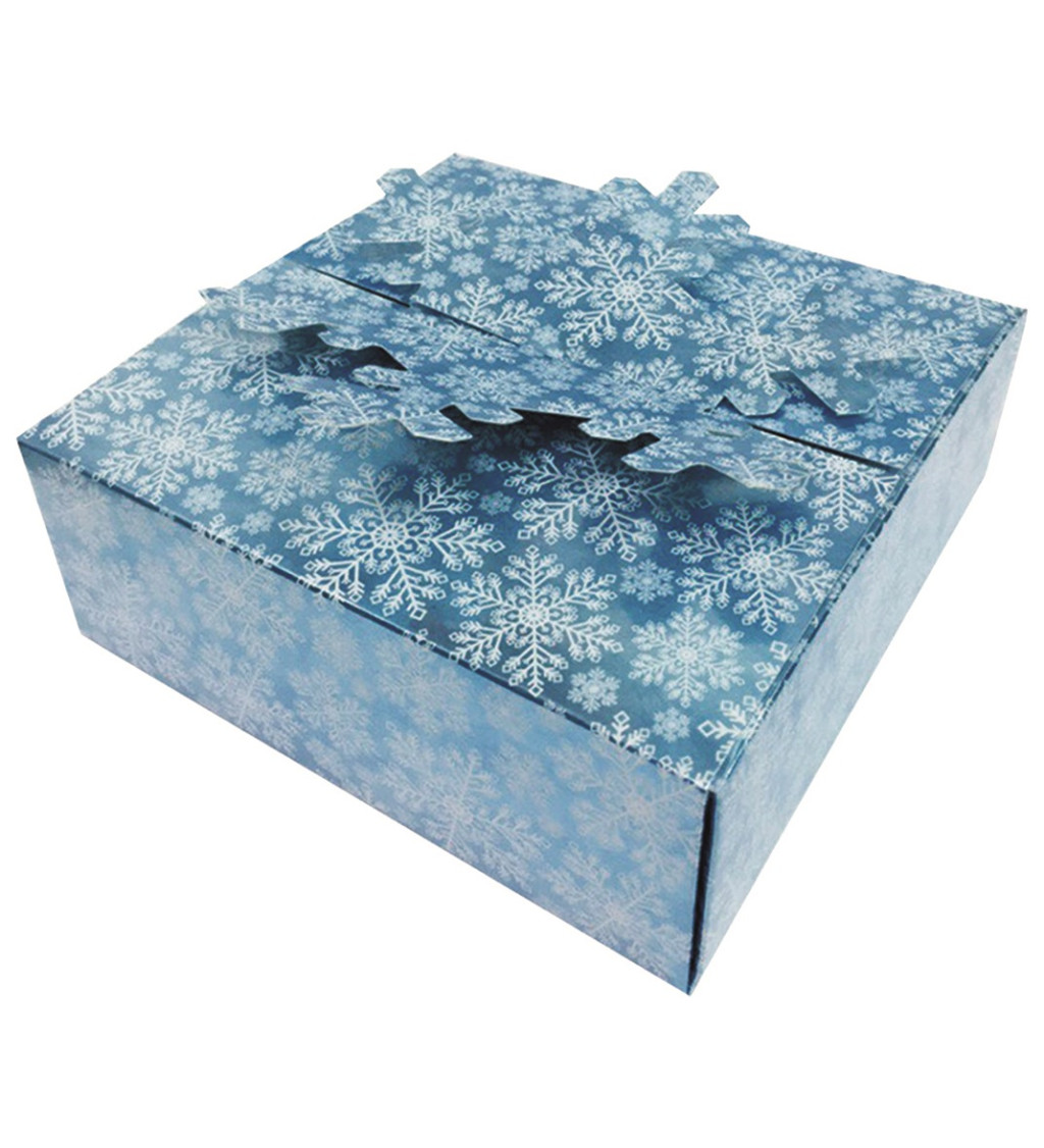 Krabička v modré barvě s bílými sněhovými vločkami